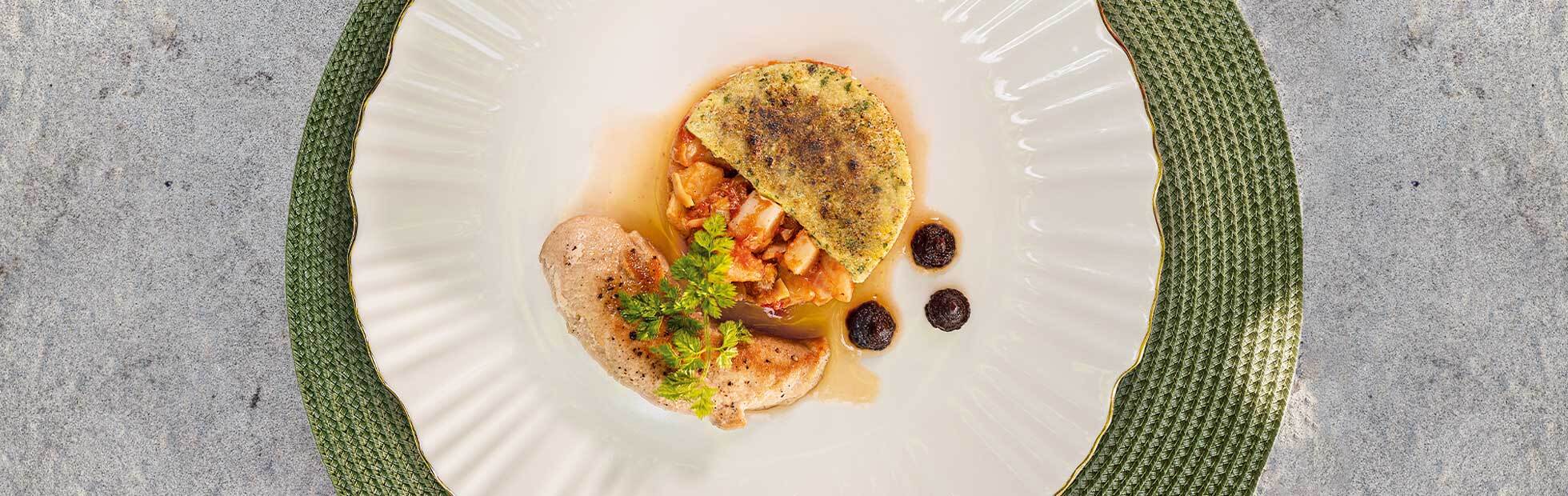 Potato and artichoke ragout with herb crust, rabbit fillet and purple carrot purée