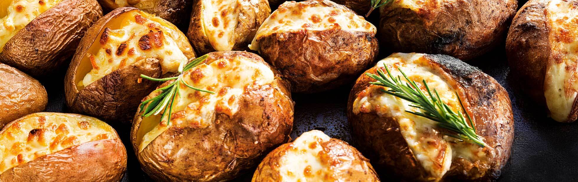 Jacket potatoes with smoked Scamorza cheese and rosemary