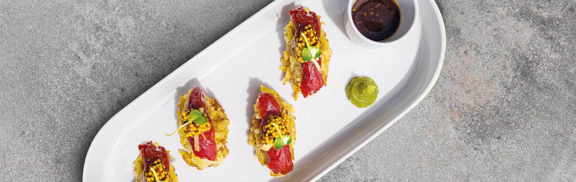 Vegan Alpine sushi with marinated watermelon and fermented Senfgold caviar