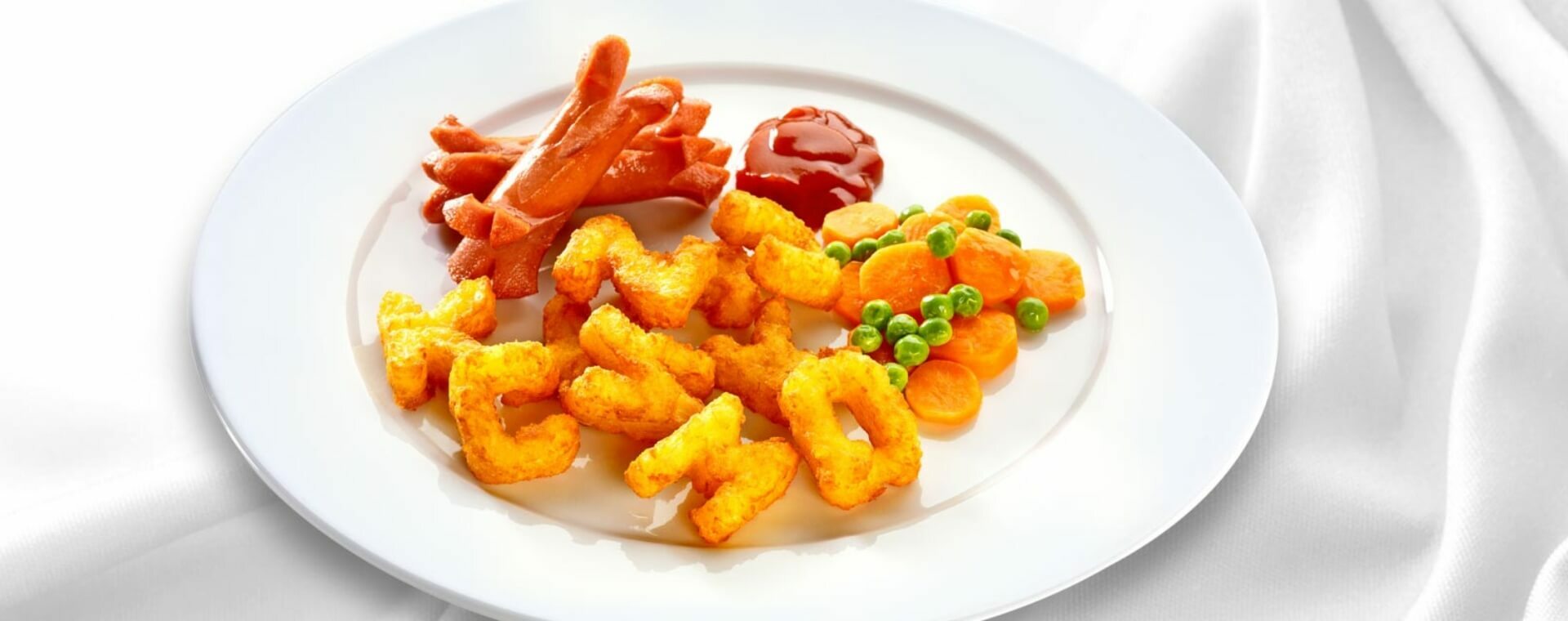 Rösti ABC 11er con salsiccia viennese e misto di carote e piselli