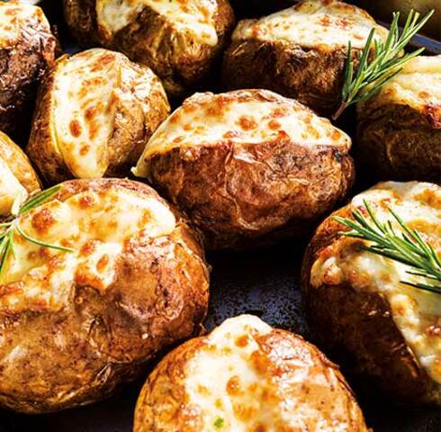 Jacket potatoes with smoked Scamorza cheese and rosemary Image