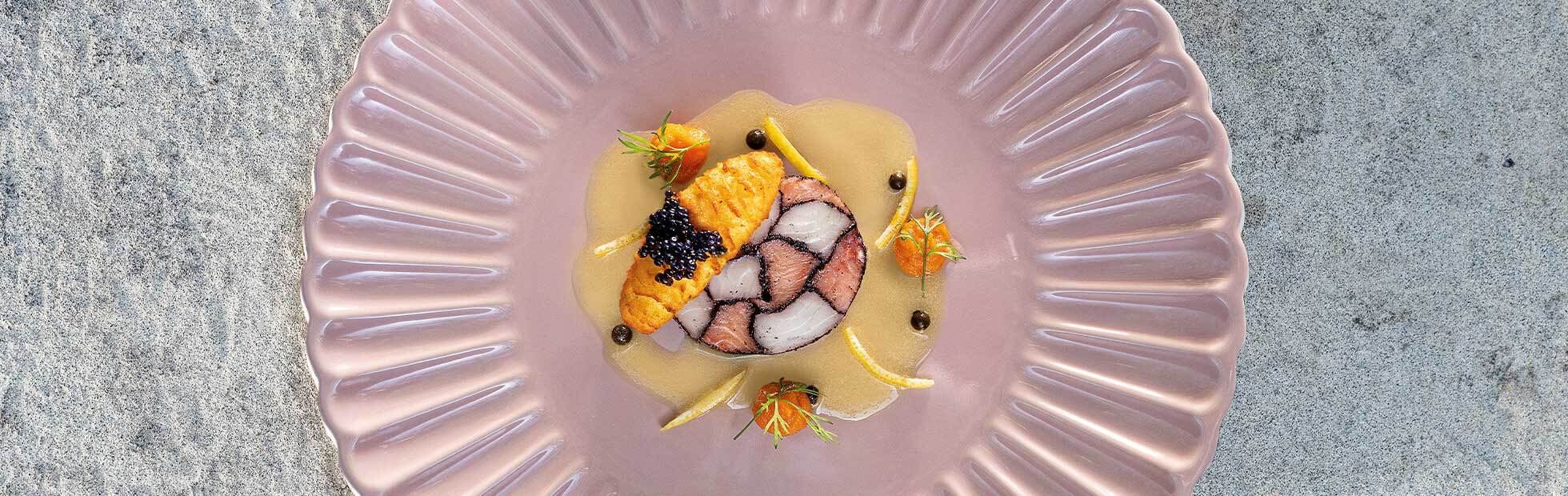 Cone croquette with caviar on poached fish mosaic terrine