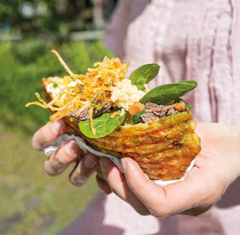 Potato Rösti filled with Viennese boiled beef served as street food Image