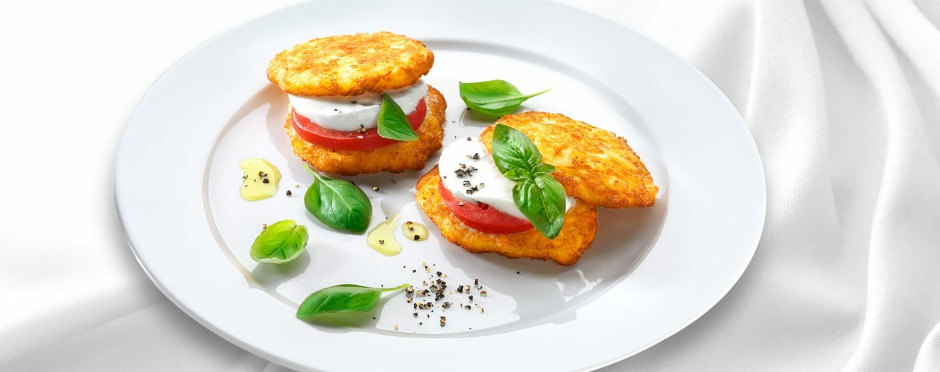 11er Knusper-Rösti mit Tomaten und Mozzarella