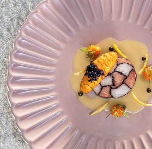Cone croquette with caviar on poached fish mosaic terrine Image